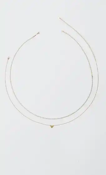 Belly chain charm corazón y brillos