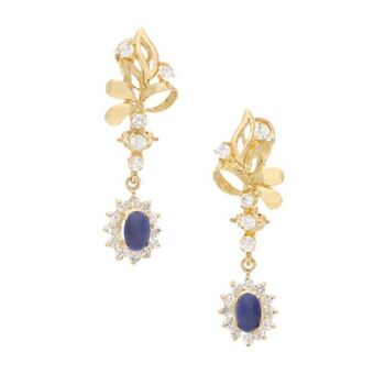 Nacional Monte de Piedad Aretes estilizados con circonias y sintéticos en oro amarillo 14 kilates. oferta