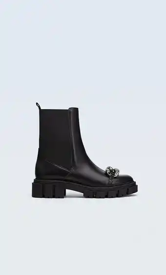 Botines planos chelsea cadena