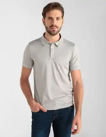 Playera tipo polo contempo estampada jaspeada para hombre