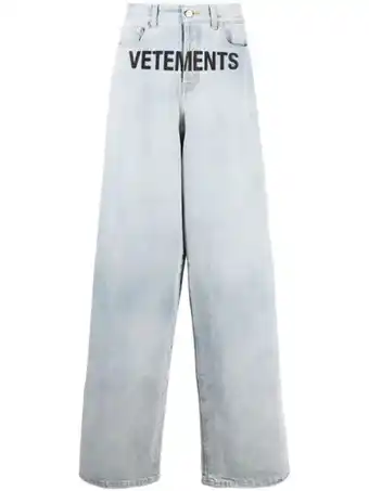 Farfetch Vetements jeans met logoprint - blauw aanbieding