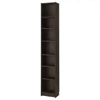 IKEA Een hoge, donkere houten billy boekenkast met meerdere planken aanbieding