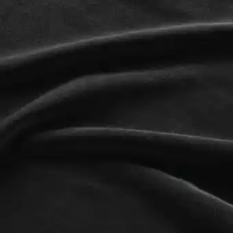 IKEA Close-up van de textuur van zwarte fluwelen stof, met een dichte pool en subtiele glans aanbieding