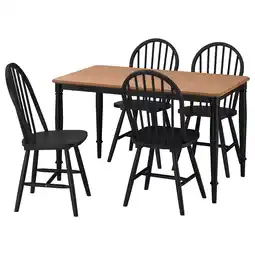 IKEA Danderyd: zwarte houten eetset, inclusief vierkante tafel en vier bijpassende stoelen aanbieding