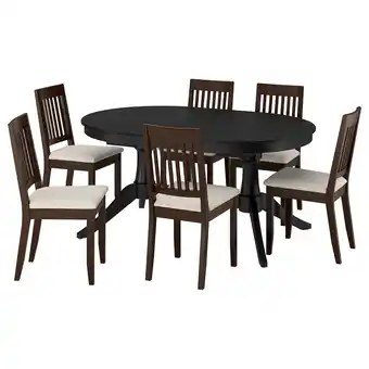 IKEA Rosentorp eethoek: zwarte ovale tafel, 6 bruine stoelen met beige kussens aanbieding