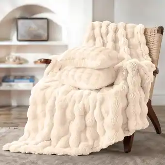 Action Pom Pom Fur plaid met kussens - crème-wit aanbieding