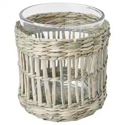 IKEA Een slipprig theelichthouder, rond, beige met rieten design. Het is gemaakt van zegge en glas aanbieding
