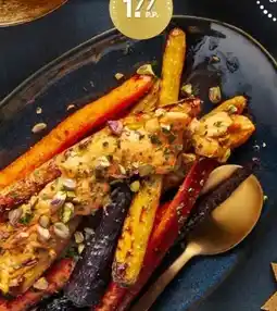 PLUS Geroosterde regenboogpeen met hummus en pistache aanbieding