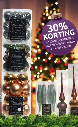 Deka Tuin op glazen kerstballen, pieken in koker, kralen en kerstslingers aanbieding