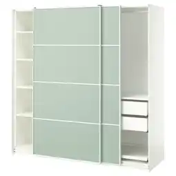 IKEA Een ikea pax kledingkast in het wit met lichtgroene schuifdeuren en meerdere planken binnenin aanbieding
