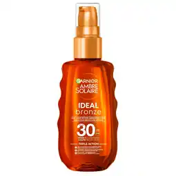 Kruidvat Garnier Ambre Solaire Ideal Bronze SPF30 Zonbeschermende Olie aanbieding