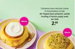 Albert Heijn AH Topped buns pistache, vanilla frosting of lemon poppy seed aanbieding