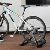 Bol.com Fietstrainer hometrainer - voor racefiets & mountainbike - 26-28 inch wielen aanbieding