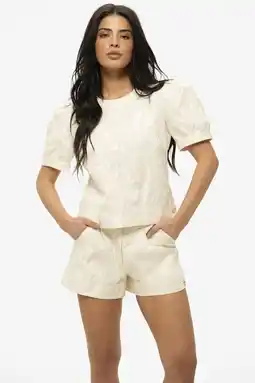 Wehkamp NIKKIE top crème aanbieding