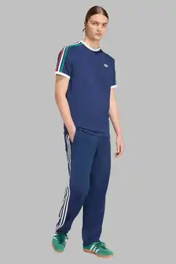 Wehkamp adidas Originals trainingsbroek Firebird blauw/wit aanbieding