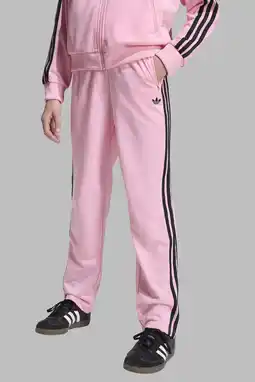 Wehkamp adidas Originals trainingsbroek Firebird roze/zwart aanbieding