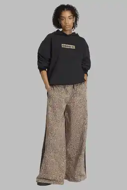 Wehkamp adidas Originals denim broek Firebird bruin aanbieding