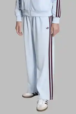 Wehkamp adidas Originals Firebird loose trainingsbroek - lichtblauw aanbieding