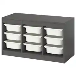 IKEA Trofast grijze opslagruimte met 12 witte containers, georganiseerd in 3 kolommen aanbieding