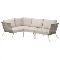 IKEA Een moderne, lichtbeige sectionele buitenbank met een metalen frame en een ontwerp van geweven touw aanbieding