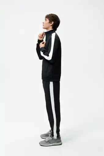 ZARA Pantalón jogger banda oferta