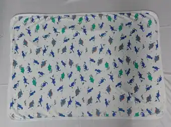 Tottus Manta algodon dinosaurios cel oferta