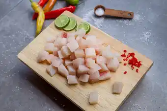 Tottus Dados de tilapia congelado x 500 gr oferta