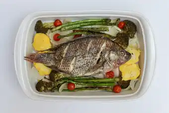 Tottus Tilapia azul eviscerada congelada chica x kg oferta