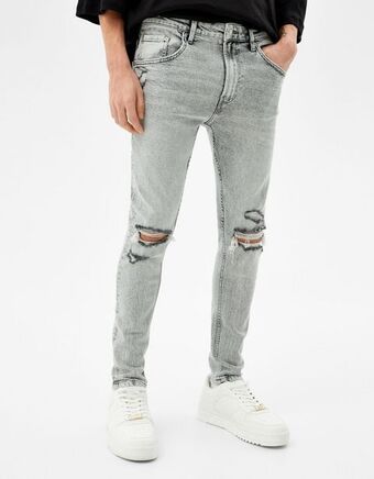 Bershka Jeansy o kroju super skinny z efektem podarcia oferta