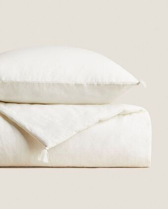 ZARA HOME Lniana kapa z pomponami oferta