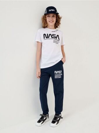 Sinsay Spodnie dresowe jogger nasa oferta