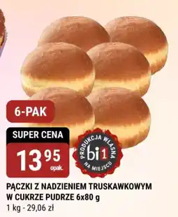 Pączki z nadzieniem truskawkowym w cukrze pudrze