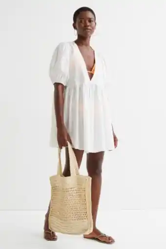 Vestido de praia com mangas tufadas