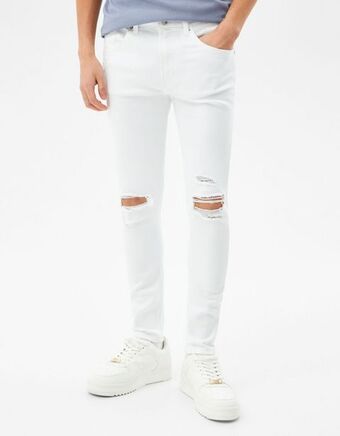 Bershka Jeans super skinny fit com rasgões promoção