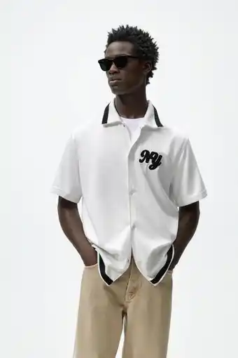 ZARA Camisa com estrutura e remendo promoção