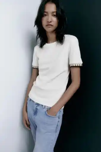 ZARA T-shirt com peças promoção