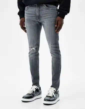 Bershka Jeans super skinny fit com rasgões promoção