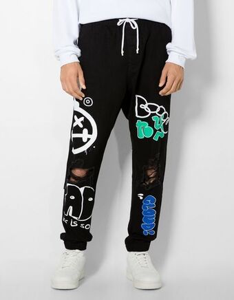 Bershka Jeans jogger com estampado e rasgões promoção