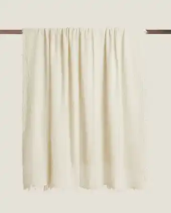 ZARA HOME Manta com lã e franjas promoção