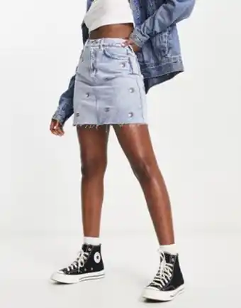 Tommy jeans all over logo denim mini skirt in light wash