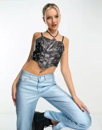Asos Heartbreak faux leather pointed hem corset top in black graffiti print promoção