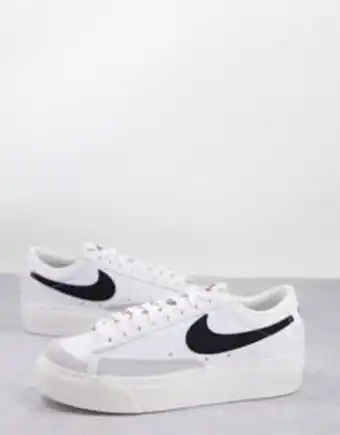 Nike blazer low platform trainers in white and black