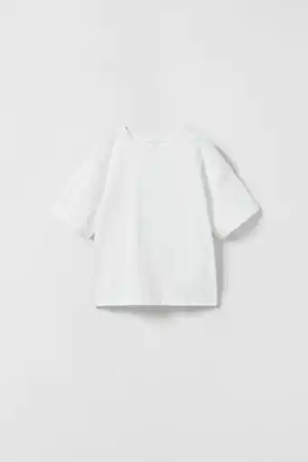 ZARA Top with criss-cross back erbjuda
