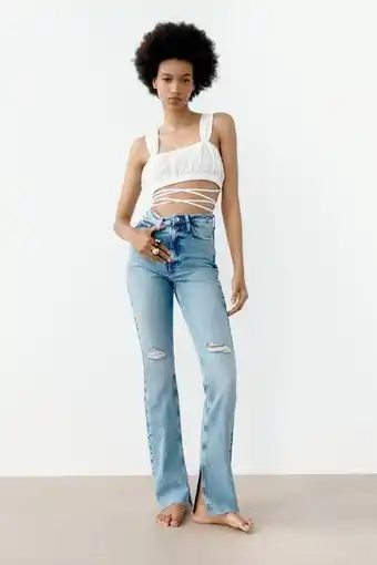 ZARA Z1975 high rise slim flared jeans with ripped details erbjuda