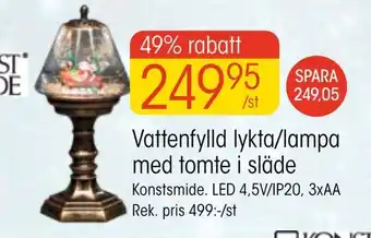 EKO Vattenfylld lykta/lampa med tomte i släde erbjuda