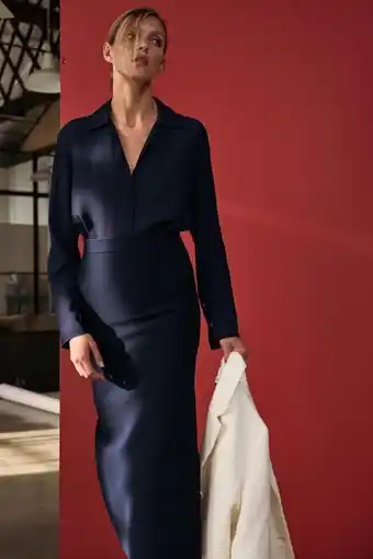 Asymmetric hem blouse
