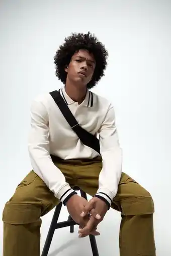 ZARA Colour block polo shirt with ribbed trims erbjuda