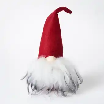 Stående tomte med stort skägg