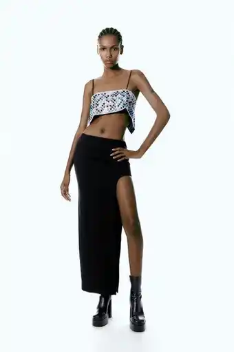 ZARA Midi skirt with side slit erbjuda