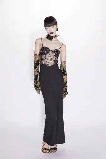 ZARA Contrast jumpsuit with sequins erbjuda